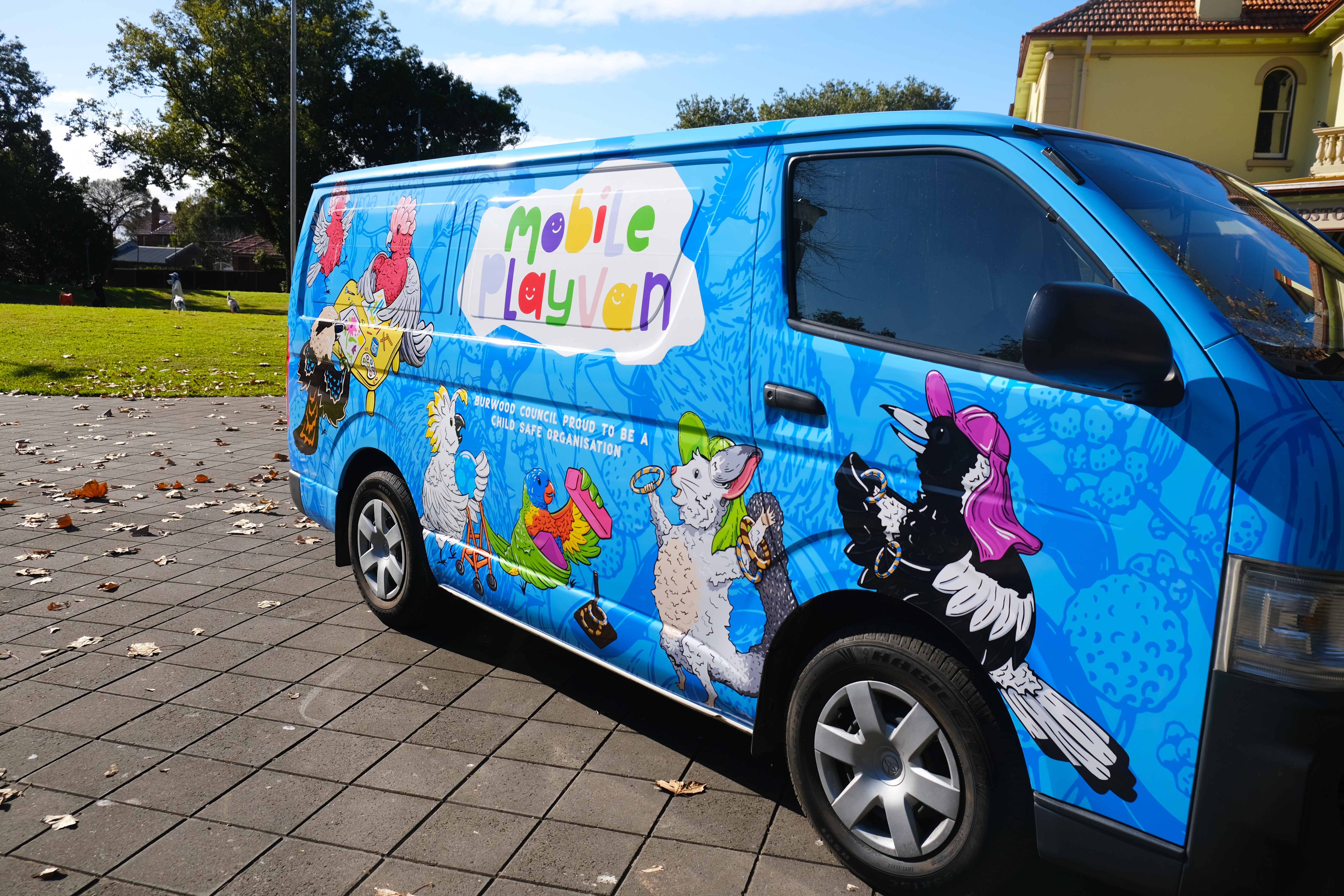 A van wrapped in colourful Australian animal themed artwork