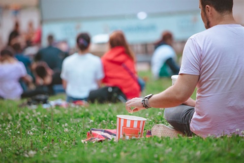 outdoor cinema - man eating popcorn.jpg