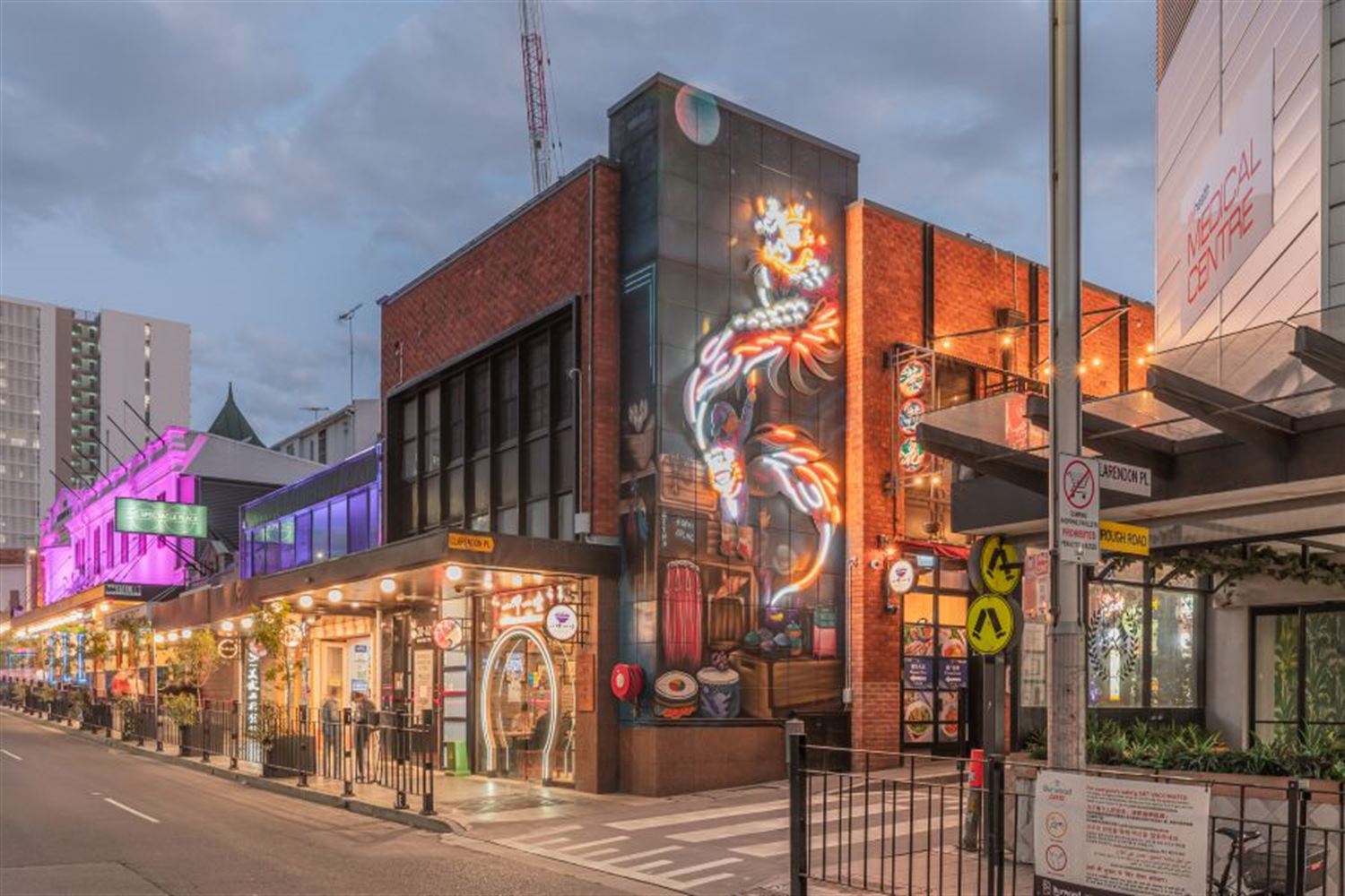 Chinese dragon art mural on the wall of clarendon place