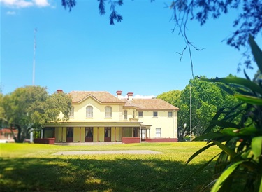 Photos of Woodstock taken from afar through the trees