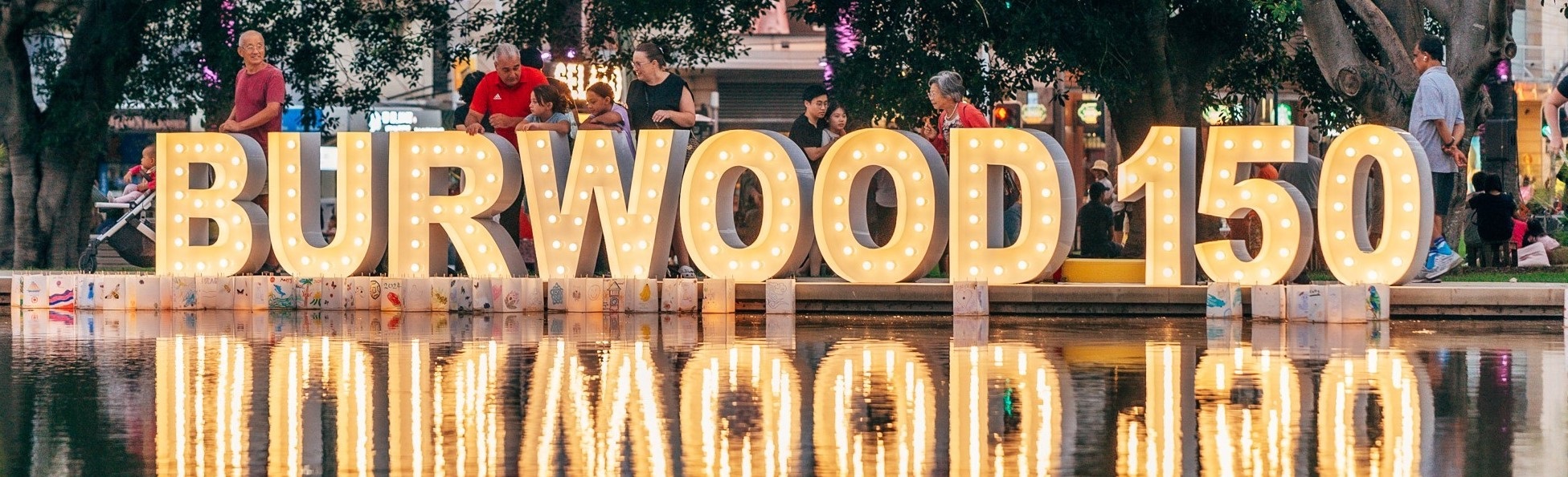 burwood 150 light up letters reflecting on pond